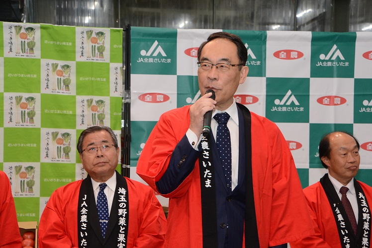 農産物トップセールスで関係者に挨拶する知事の写真